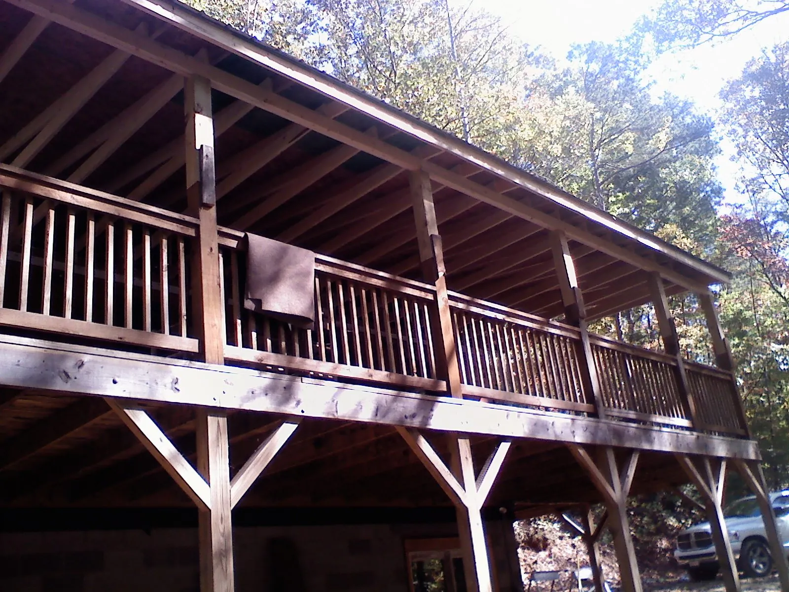 Timber framing under a new elevated porch and deck — Roof Leak Repair in Luxemburg by Roofing Brothers